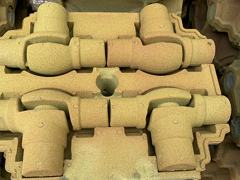 Wie löste ich den Sandstiftdefekt bei der Herstellung von grauen Gusseisenteilen mithilfe der filmbeschichteten Sandtechnologie?